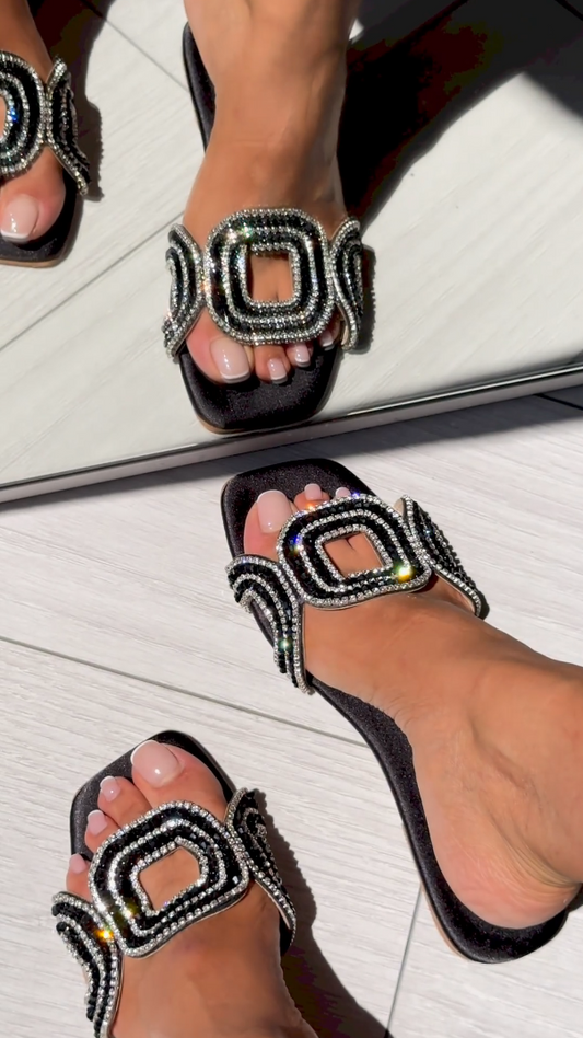 Three diamond-studded flat sandals