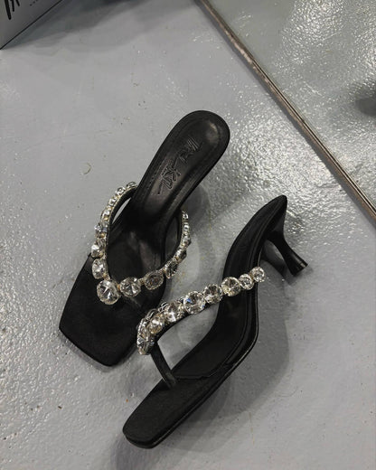 Diamond-encrusted low-heeled black sandals