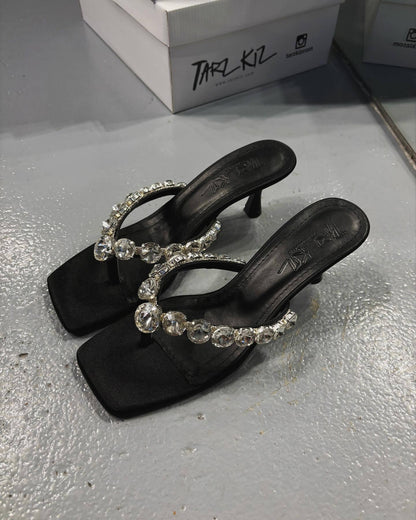 Diamond-encrusted low-heeled black sandals