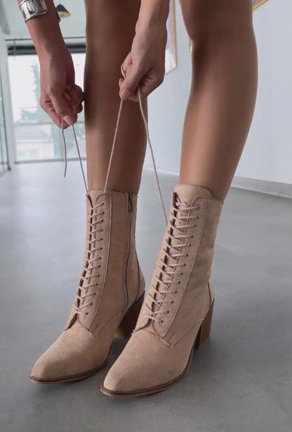 Light brown suede mid-calf lace-up boots